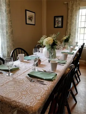 A table set with plates and napkins for dinner.